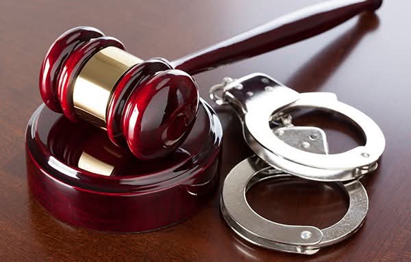 Killer cops get lengthy prison sentences