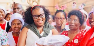 A new mom is congratulated by prayer warriors at Chris Hani Baragwanath Hospital on Christmas Day after she has delivered a bouncing baby