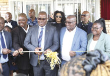 Premier Panyaza Lesufi with MECs Jacob Mamabolo, Matome Chiloane and Ekurhuleni Executive Mayor Nkosiphendule Xhakaza handing over the school.