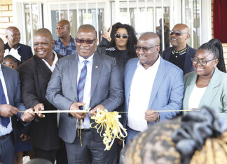 Premier Panyaza Lesufi with MECs Jacob Mamabolo, Matome Chiloane and Ekurhuleni Executive Mayor Nkosiphendule Xhakaza handing over the school.
