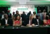 Minister Willie Aucamp and SanParks interim chairperson flanked by Kruger National Park beneficiaries