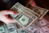 FILE PHOTO: Illustration shows U.S. dollar banknotes