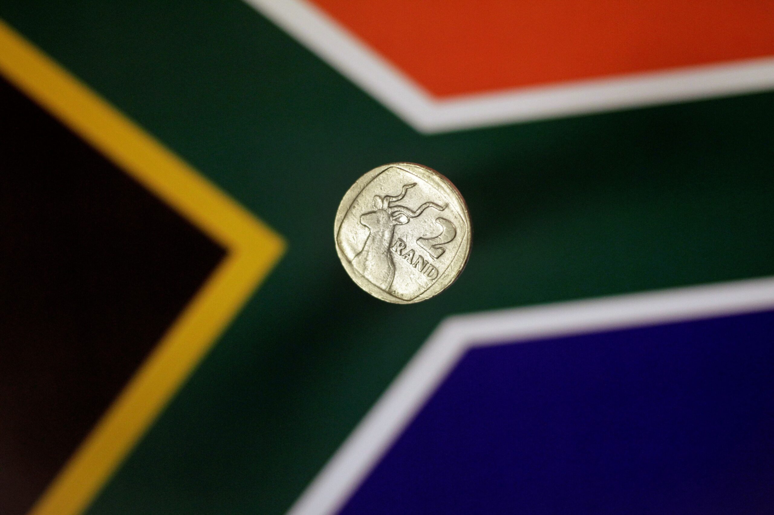 Rand firms as softer dollar offsets dour producer inflation figures