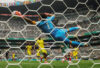 The Wider Image: The World Cup’s first round of group matches in photos