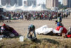 Malawi citizens seeking to return home wait to be processed by border officials in Durban