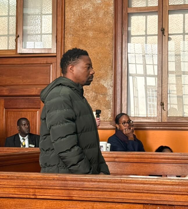 British man accused of killing wife, daughters in court over gun, immigration charges
