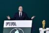 FILE PHOTO: Soccer Football – 76th FIFA Congress – Vancouver Convention Centre, Vancouver, Canada – April 30, 2026  FIFA President Gianni Infantino speaks during the congress as the FIFA World Cup Trophy is seen REUTERS/Jennifer Gauthier
