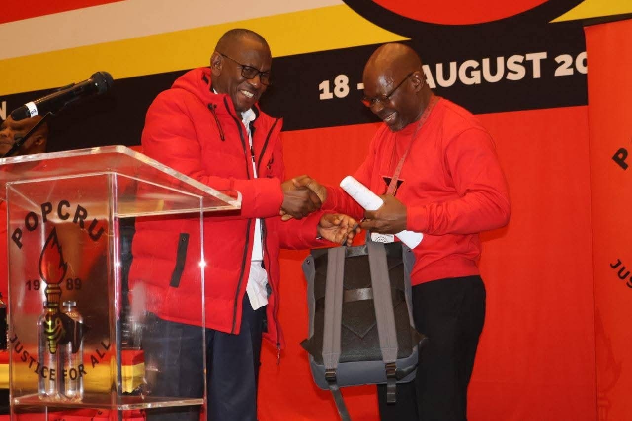 Popcru's Thulani Ngwenya and SACP's Solly Mapaila at the POPCRU CEC meeting.