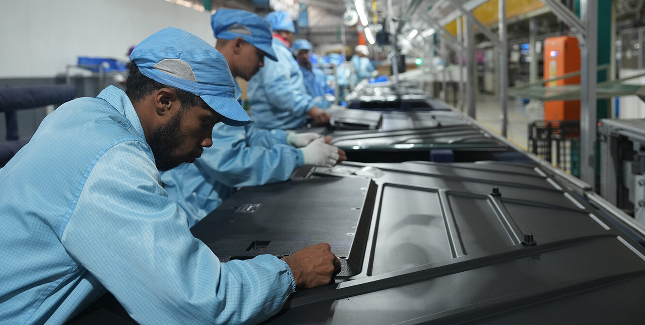 Local South African workers assembling electronics on the production line at Hisense SA Industrial Park in Atlantis.